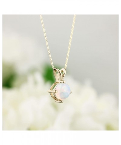 14K Yellow Gold Natural Rainbow Ethiopian Opal (6mm) Cabochon Necklace. 18" Yellow Gold Box Chain. Pendant & Chain $54.12 Nec...