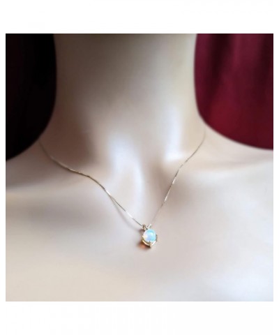 14K Yellow Gold Natural Rainbow Ethiopian Opal (6mm) Cabochon Necklace. 18" Yellow Gold Box Chain. Pendant & Chain $54.12 Nec...